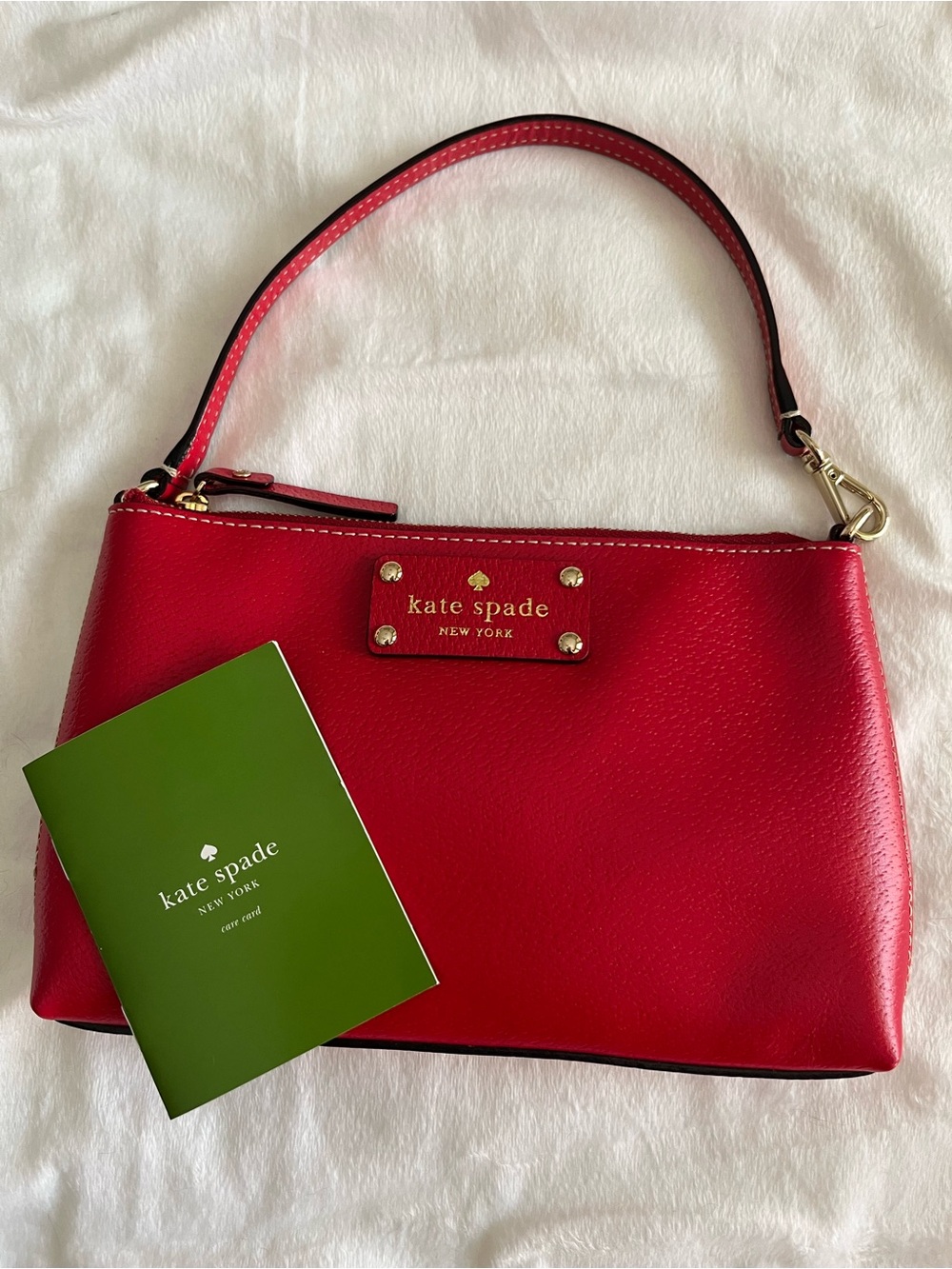 kate spade red leather shoulder bag/wristlet with gold hardware